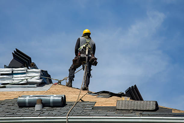 Professional Storm Damage Roof Repair technician working in La Quinta, CA